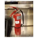 RED FIRE EXTINGUISHER