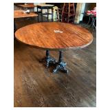 51" ROUND WOOD TOP TABLE WITH CAST IRON BASES