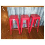 RED METAL STACKABLE STOOLS
