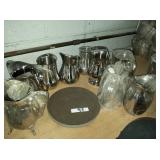 LOT OF 9 SS PITCHERS & 3 ROUND SERVING TRAYS