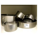 LOT OF 10 SS RINGS ASSORTED SIZES