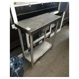 SS TABLE 31" X 13" X 36" TALL