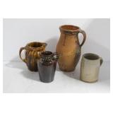 5 SMALL CERAMIC PITCHERS
