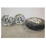 3 CHEVY RIMS AND 1 FIRESTONE TIRE
