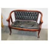 LEATHER CUSHIONED BENCH ON CASTERS