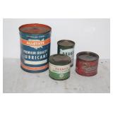 FOUR ADVERTISEMENT CANS