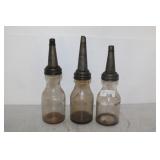 THREE GLASS OIL BOTTES WITH SPOUTS