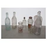 8 ADVERTISING BOTTLES