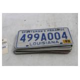 NINE VARIOUS LICENSE PLATES