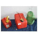 2 GASOLINE CANS AND WATERING CAN
