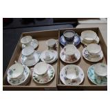 TEA CUPS AND SAUCERS