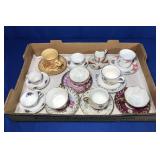 11 TEA CUPS & MATCHING SAUCERS