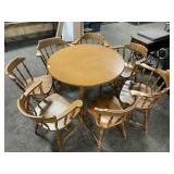 42" ROUND TABLE W/7 CAPTAINS CHAIRS