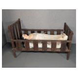 ANTIQUE PAPER MACHE DOLL WITH CRIB