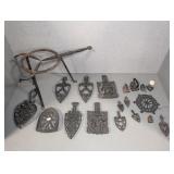 CAST IRON TRIVETS AND MINI  IRONS