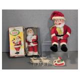VINTAGE MECHANICAL AND STUFFED SANTA CLAUS