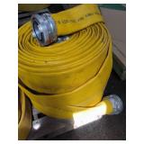 Two Yellow Fire Hoses with Couplings