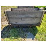 Wooden rolling cart with metal wheels