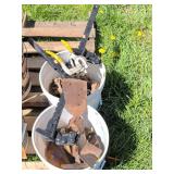 Farm Tools and Chains in Buckets