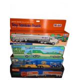 Four Toy Tanker and Race Trucks
