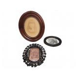 Three Framed Portrait Photographs