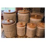 7 Ceramic Canisters with Wooden Lids