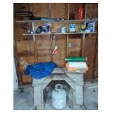 Contents of garage shelves including tools