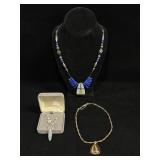 Three Pendant Necklaces, One Sterling Piece