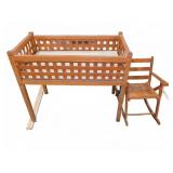 Wooden Cradle and Child