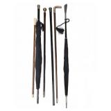 4 Walking Canes and 2 Umbrellas