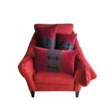 Red Upholstered Armchair With Decorative Pillows