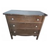Wooden Three-Drawer Dresser With White Knobs