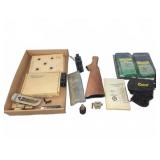 Gun Parts With AR-15 Brass Catchers And Manuals