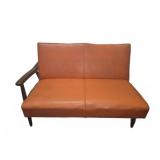 Orange Vinyl Two Seat Sofa With Wooden Arms