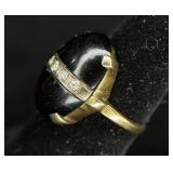 Black Stone Ring w/ Five Diamond(?) Stones
