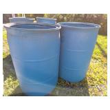 Two Blue Plastic 55-Gallon Drums