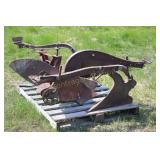 FOUR OLDER CAST PLOWS