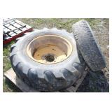 16" IMPEMENT TIRE (CRACKED) 14.9 - 24 TIRE ON RIM