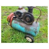 OLDER SMALLER ELECTRIC COMPRESSOR