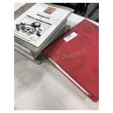 2 BINDERS OF GEHL SKID LOADERS