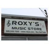 SIGN ON EAST SIDE OF BUILDING
