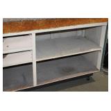 CARPETED TOP DISPLAY COUNTER ON WHEELS