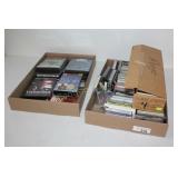 2 BOXES OF MOVIES AND TAPES