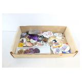 GROUPING OF PINS AND ADVERTISING BUTTONS