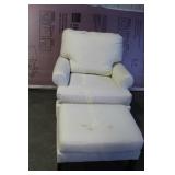 TAN COVERED UPHOLSTERED CHAIR & OTTOMAN