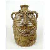 Folk Art Pottery Face Jug