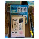 2 VINTAGE HAIR CUTTING KITS