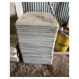 STACK OF ALUMINUM BAKING PANS