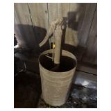 VINTAGE HAND PUMP IN METAL BARREL