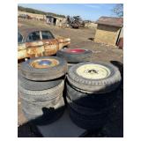PALLET OF VINTAGE TIRES AND WHEELS